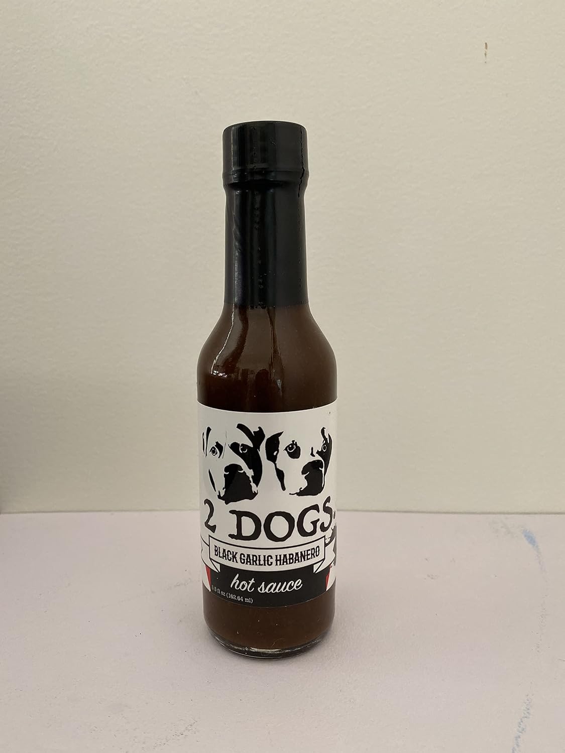 2-Dogs-Hot-Sauce-(Black-Garlic-105